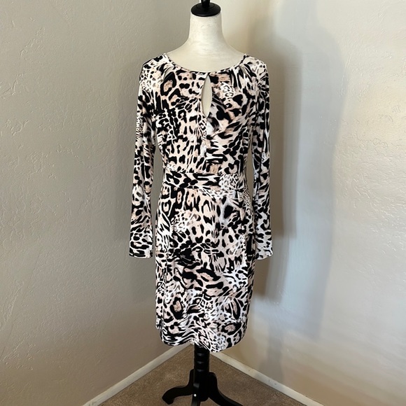 2025 New Popular trade women's clothing popular autumn and winter round neck long-sleeved leopard print short skirt horn sleeve personalized street dress